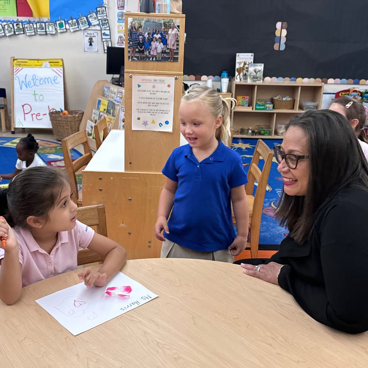 Students and an educator learning together in an Antilles classroom