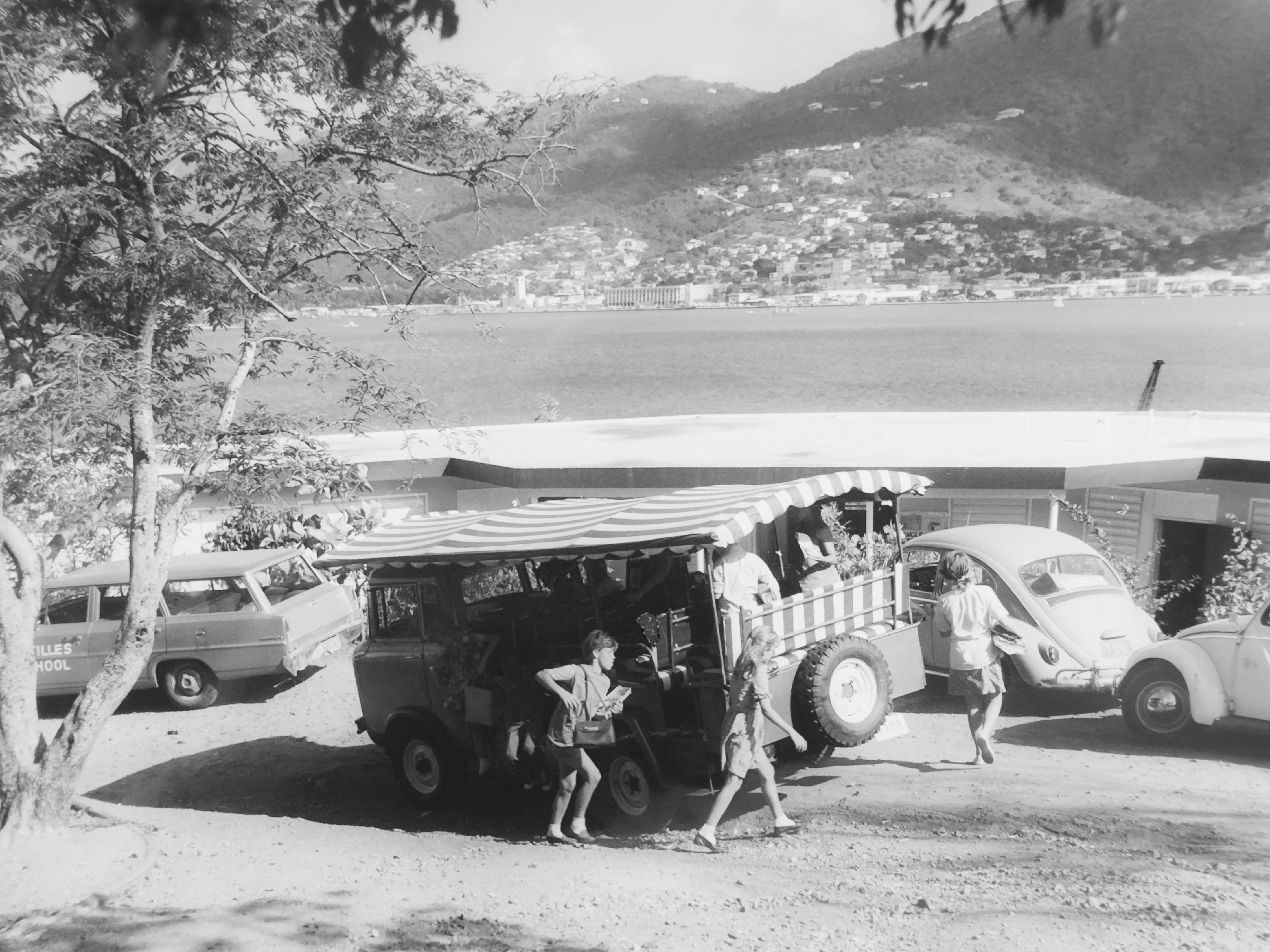 Antilles students arriving by safari bus at the Havensight campus in the 1960s