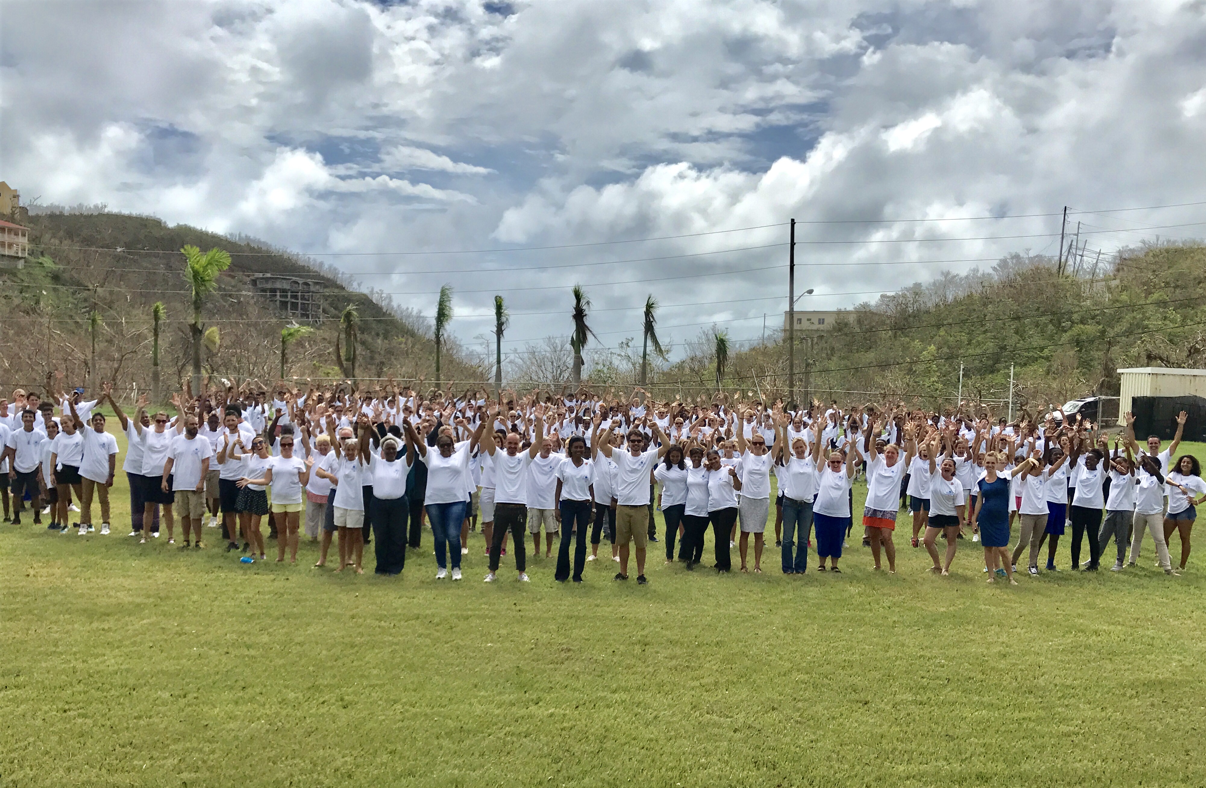 The Antilles community gathered on the field after the 2017 hurricanes